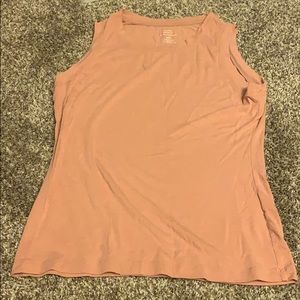 A sleeveless nudeish tank top